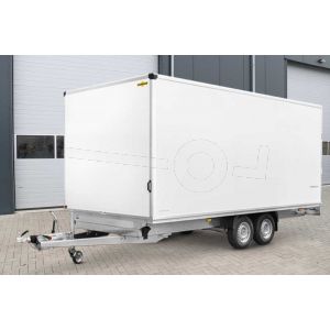 Humbaur HK 353218-20PF30 gesloten aanhangwagen met wielen onder de laadbak die is opgebouwd uit witte 30mm purferro panelen