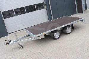 Vlakke plateauwagen zonder borden Eduard, afmeting 330x180cm, laadvloerhoogte 63cm en bruto laadvermogen 2700kg.