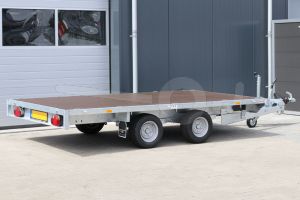 Vlakke plateauwagen Eduard zonder borden 330x180cm. Laadvloerhoogte 56cm en bruto laadvermogen 3000kg.