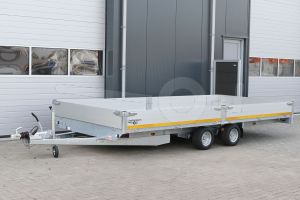 Eduard tandemas plateauwagen met 30cm hoge borden. Afmeting 506x200cm, laadvloerhoogte 56cm, bruto laadvermogen 2700kg.