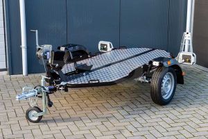 Cochet Uno verlaagbare motortrailer opvouwbaar in de kleur zwart